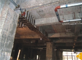 廣西區(qū)圖書館屋面梁底包鋼加固